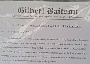 'Notice of Peaceable Re-entry' at Alworths, Llandudno (7 Mar 2011). Photograph by Dave Roberts