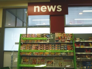 Newspapers, Asda Supermarket, Gateshead (8 Aug 2011). Photograph by Graham Soult