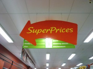 'SuperPrices' sign at Asda Supermarket, Gateshead (8 Aug 2011). Photograph by Graham Soult