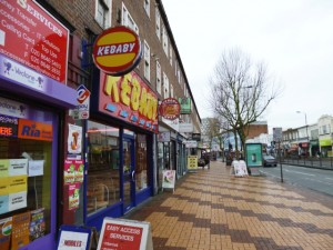 Businesses in London Road, Morden (1 Mar 2013). Photograph by Graham Soult