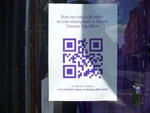 Shrewsbury wine merchant Tanners using a QR code to drive traffic to its website (10 Jun 2013). Photograph by Graham Soult