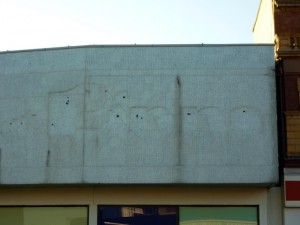 The outline of the former Binns logo can still be seen (16 Nov 2010). Photograph by Graham Soult